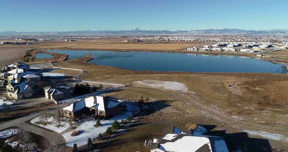 Mountains and a small lake in the early winter in this Northern Colorado neighborhood.