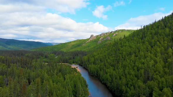 4K Drone Video (high elevation) of Mountains and Blue Sky above Chena River at Angel Rocks Trailhead