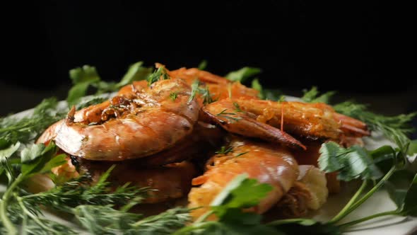 Greenery Falls Onto Shrimps with Dill and Parsley on Plate