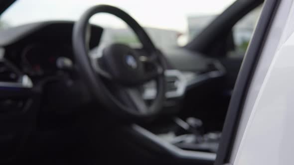 A Man Unlocks and Locks a Modern Car Using a Keyless Access - Detail of Door