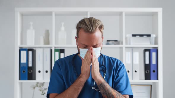 Professional medical doctor in hospital office, Portrait of young and confident physician.