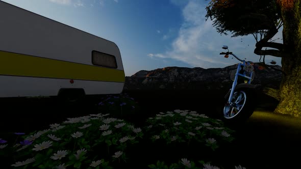 Caravan and Man Watching Sunset Over it alt