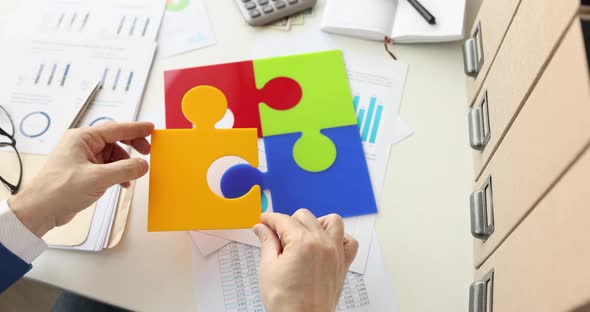 Businessman Puts Color Puzzles on Table in Office  Movie