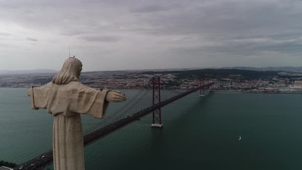 Aerial view of Catholic statue Christ the King at Almada overlooking Lisbon.