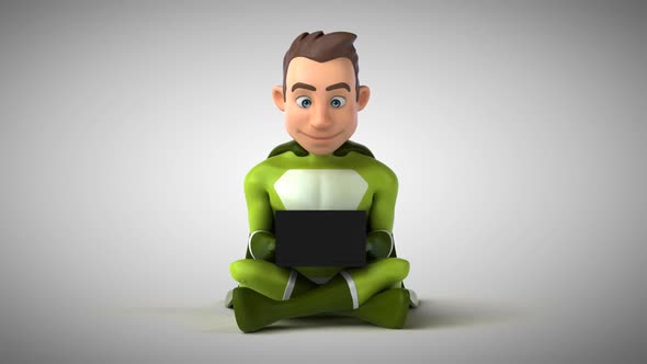 Fun 3D cartoon superhero typing on a laptop