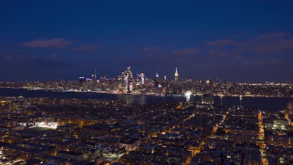 Urban Skyline of Midtown Manhattan and Hoboken at Night