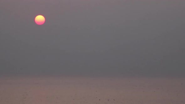 Smoky Sunset at the Beach