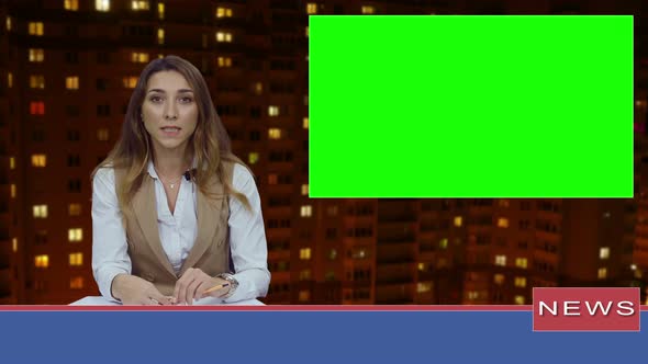 Female News Presenter in Broadcasting Studio With Green Screen Display For Mockup Usage