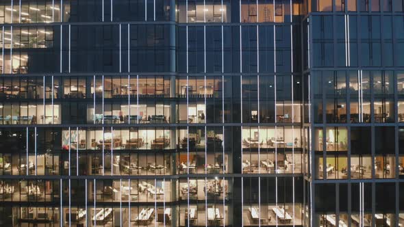 Drone Shot of Skyscraper Offices at Night Camera