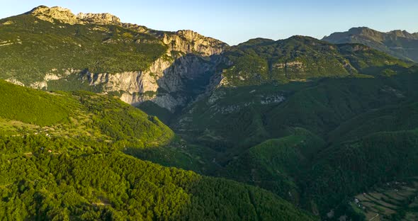 Sunrise time lapse in mountains with moving shadows