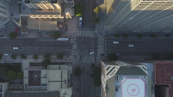AERIAL: Slow Birds Eye View Flight Over Downtown Los Angeles California in Beautiful Sunrise Light