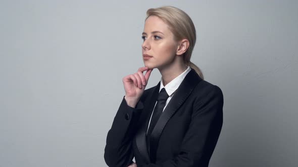 Style businesswoman in a classic business suit