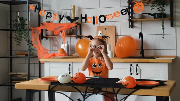 Little Girl in Halloween Costume Having Fun