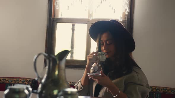 Tourist Drinking Turkish Coffee