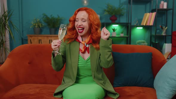 Joyful Redhead Girl Drinking Champagne Celebrate Success Win Career Grow Up Purchase of New Home