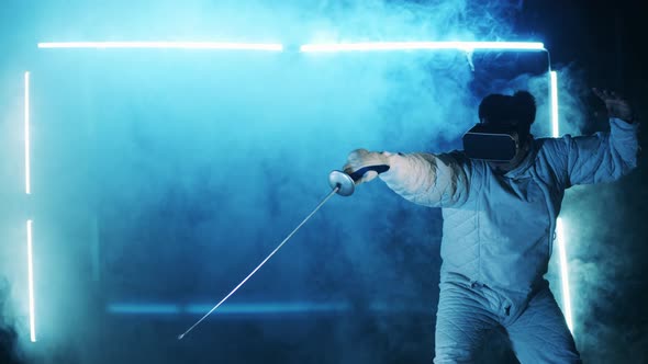 A Man is Practicing Fencing in Virtual Reality