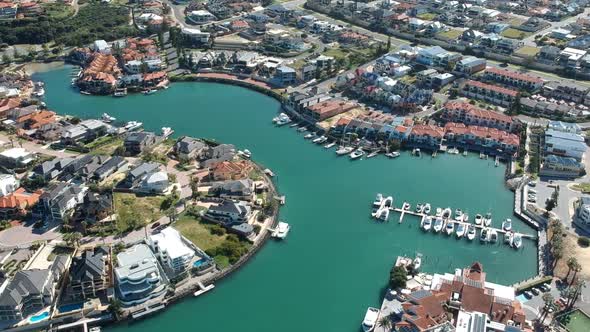 Aerial drone side pan of Mindarie Marina Western Australia  looking down