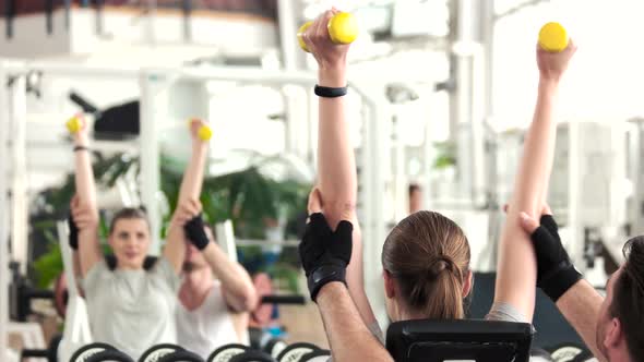 Female Person Working Out at Gym.