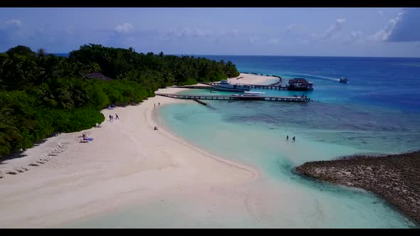 Aerial drone nature of paradise sea view beach voyage by blue sea and white sandy background of a pi