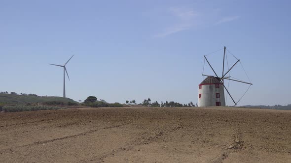 Wind-powered fan and mill with brown field