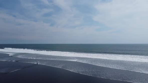 Beautiful Footage of Black Sands and low tide waves along the coast