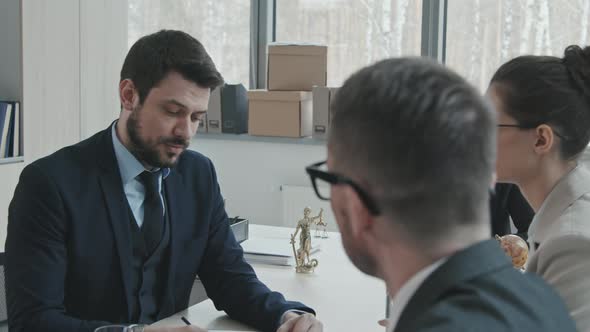 Lawyer Representing Interests of Client at Negotiations