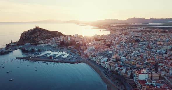 Coastal city with port and beach