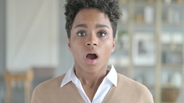 Portrait of Young African Girl Getting Shock