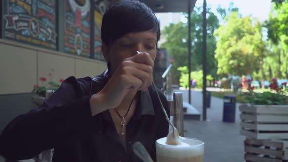 Brunette Enjoy Drink Outdoors in Summer