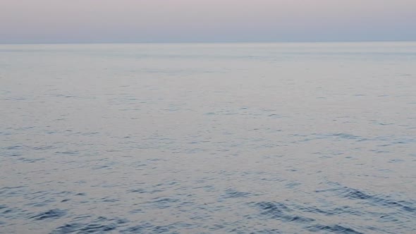 Horizon Line Between the Surface of the Sea with Ripples on the Water