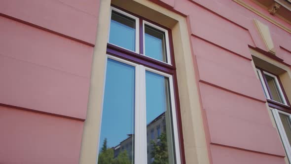 Bright Pink Building with Unusual Window in Ljubljana