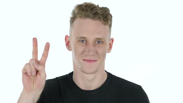 Victory Sign By Young Man on White Background