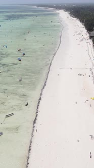 Vertical Video Boats in the Ocean Near the Coast of Zanzibar Tanzania