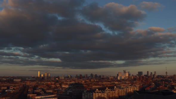 Wide shot of skyline of Rotterdam, the Netherlands at sunset