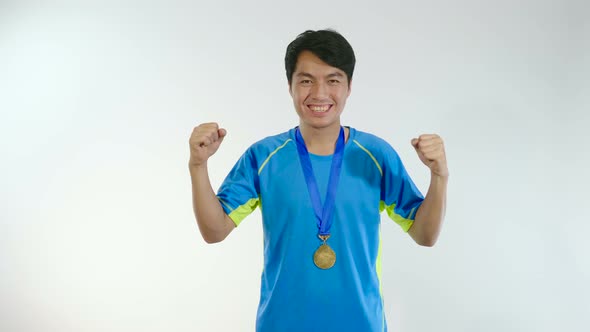 Asian Man Happy With Gold Medal