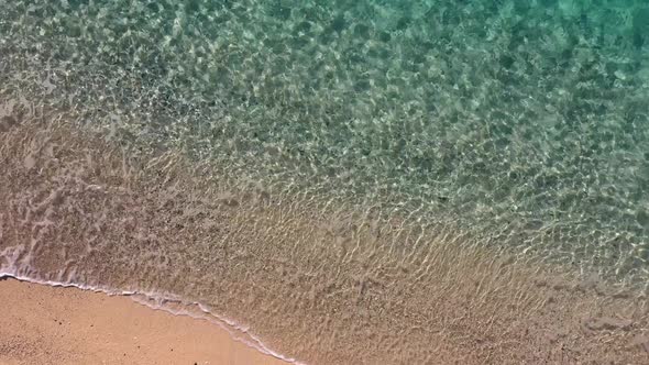 Drone View of Coastline with Clear Turquoise Water