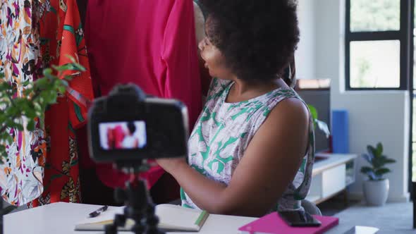 African american female plus size vlogger recording a video about fashion