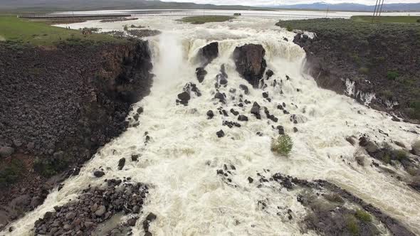 Aerial view of huge overflow waterfall at Magic Reservoir