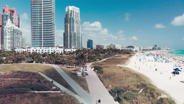 Miami Beach From South Pointe Park Slow Motion Aerial View on a Beautiful Sunny Day