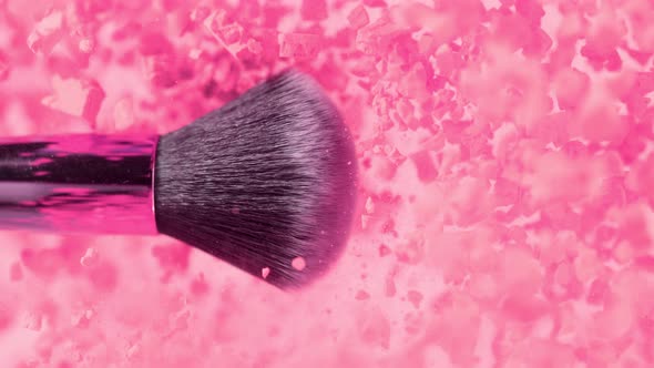 Super Slow Motion Shot of Makeup Brush and Pink Powder Explosion at 1000 Fps