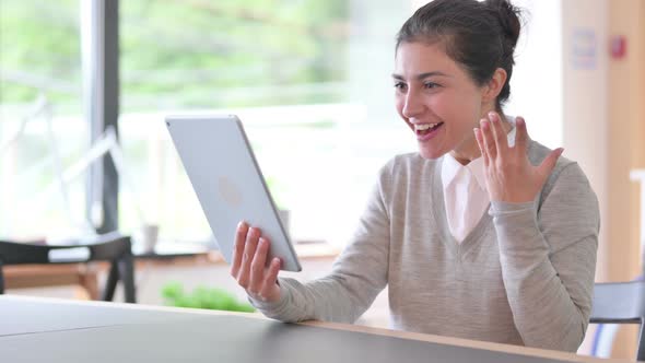 Successful Indian Woman with Tablet Celebrating 