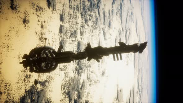 3D Illustration of a Spaceship in Orbit Around Planet Earth alt