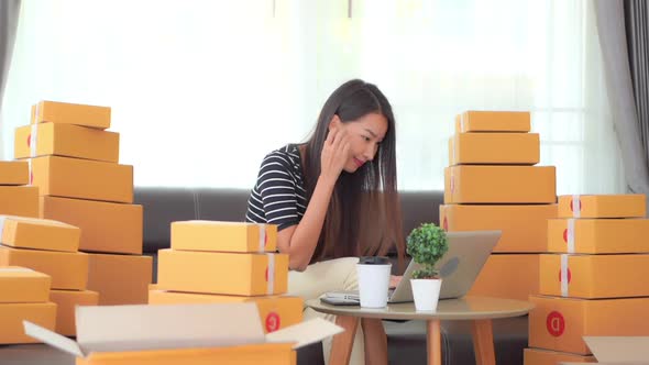 Woman with packing box ready for shipping