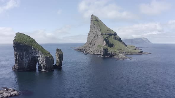 Aerial Drone View on Drangarnir Sea Stack in the Atlantic Ocean on the Faroe Islands