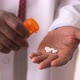 Close up of doctor's hands displaying  medication - VideoHive Item for Sale