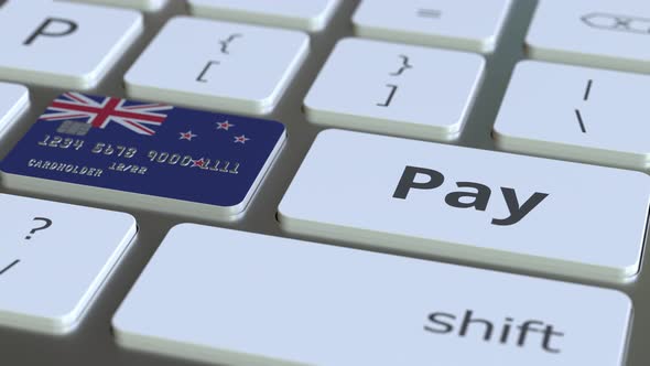 Bank Card Featuring Flag of New Zealand As a Key on Keyboard