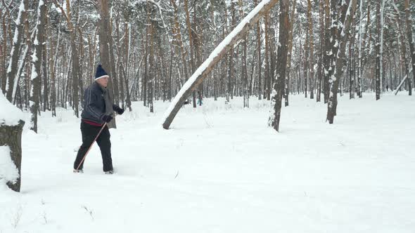 Senior in Winter To Cross Country Skiing on Snow Skis