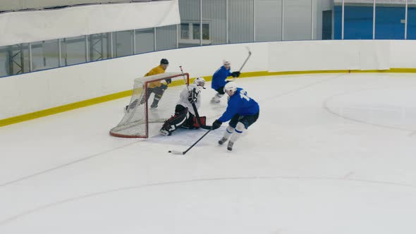 Ice hockey player shooting goal
