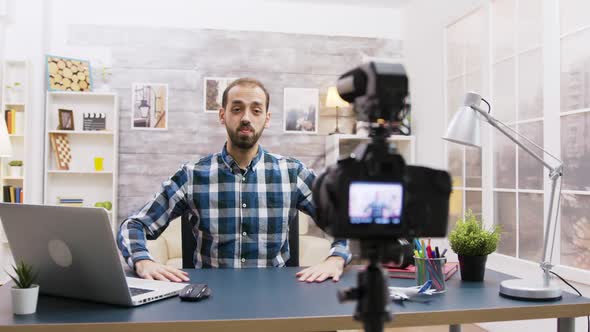 Young Vlogger Talking with His Subscribers on Social Media