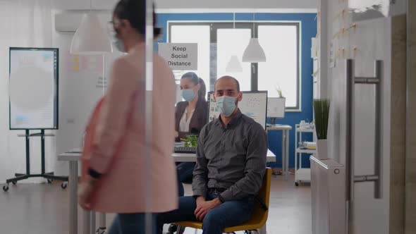 Portrait of Entrepreneur Man Wearing Protective Face Mask Against Coronavirus Pandemic